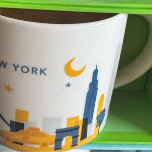 Cityscape Mug with Blue and Yellow Design